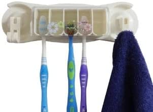 Toothbrush holder with towel holder