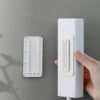 Non-Marking Self-Adhesive Plug Holder No Hole Wall Mounted Cable Organizer For Home Use